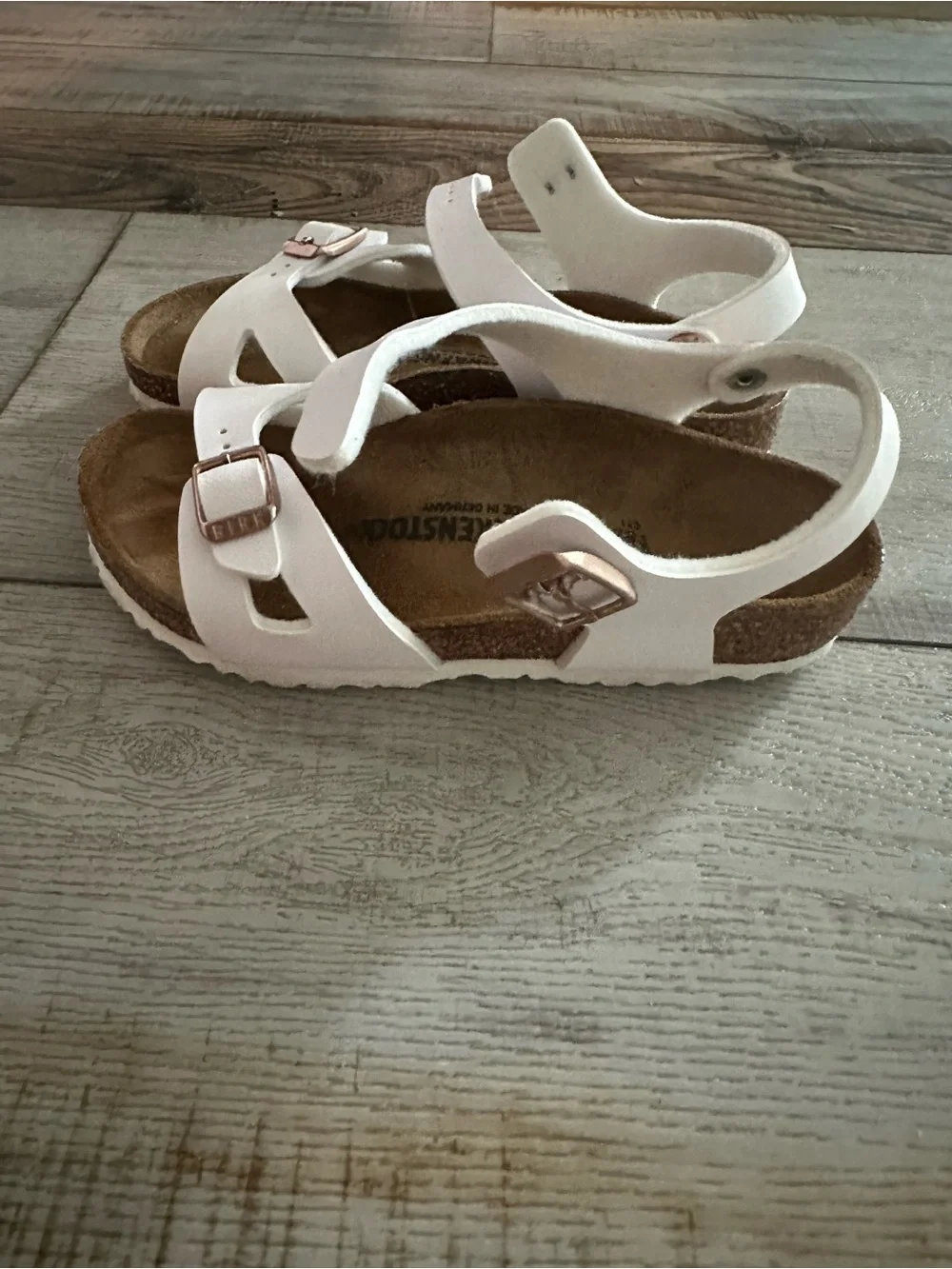 Birkenstock Kids White Sandals with Rose Gold Buckles